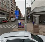 Mupi en Fray Luis de León junto a El Corte Inglés Mupi publicitario en Fray Luis de León, León